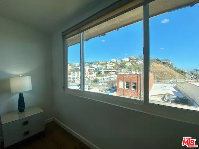 a view of a room with a window