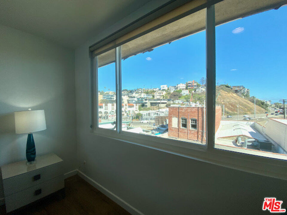 6824 Esplanade, Unit PH Playa del Rey, CA 90293 - Photo 13 of 20 a view of a room with a window