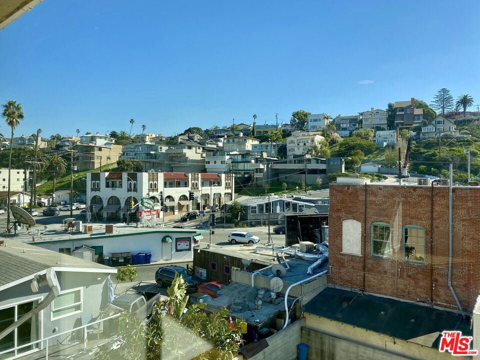 6824 Esplanade, Unit PH Playa del Rey, CA 90293 - Photo 15 of 20 a view of a patio with couches table and chairs