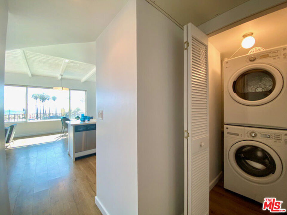 6824 Esplanade, Unit PH Playa del Rey, CA 90293 - Photo 7 of 20 a view of a hallway with washer and dryer