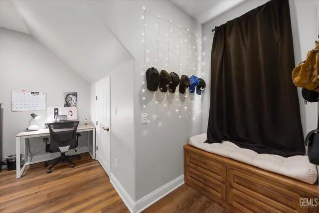 a view of a house with a street