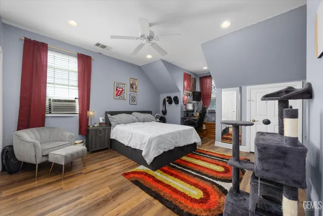 a swimming pool with outdoor seating and yard