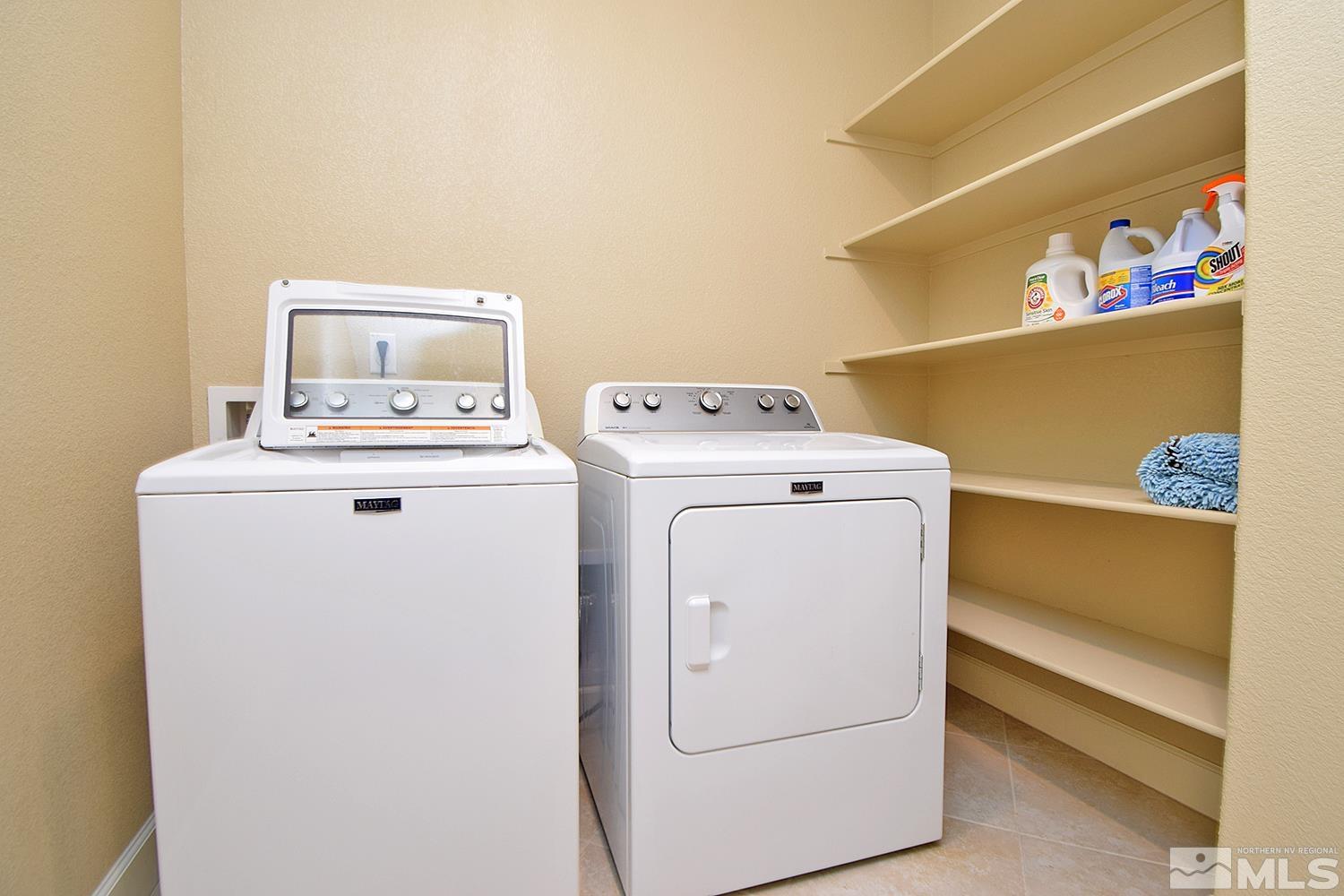 9729 Pachuca Drive Reno, NV 89521 - Photo 33 of 40 a utility room with dryer and washer