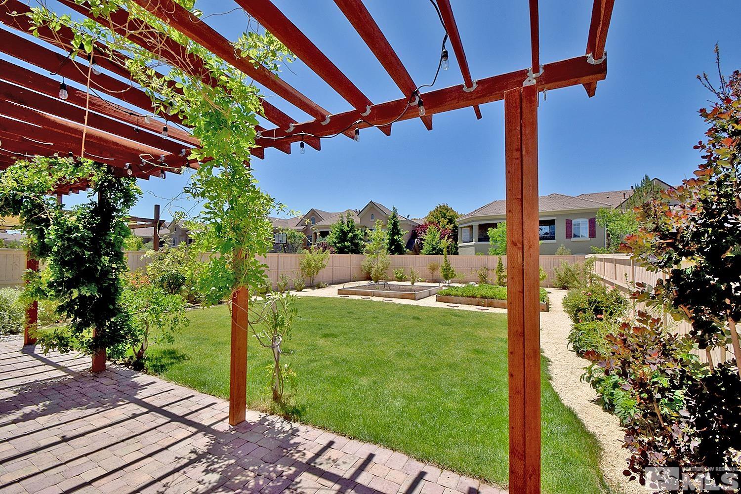 9729 Pachuca Drive Reno, NV 89521 - Photo 35 of 40 a view of a porch with a backyard