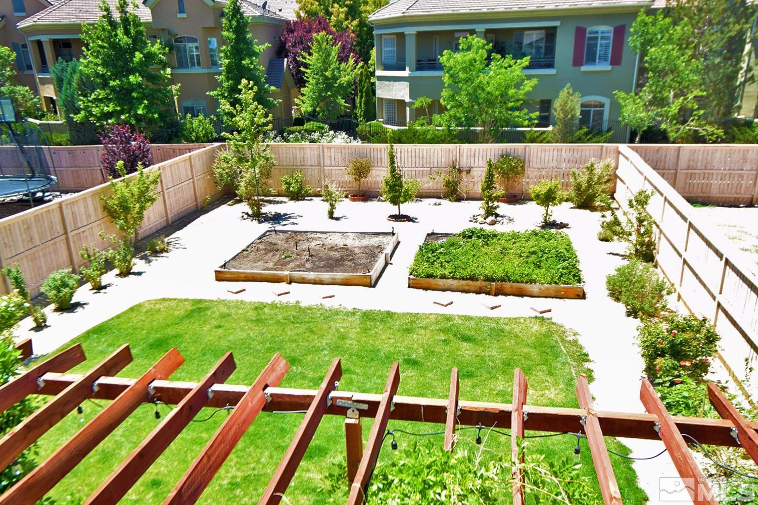 9729 Pachuca Drive Reno, NV 89521 - Photo 36 of 40 a view of a backyard with plants