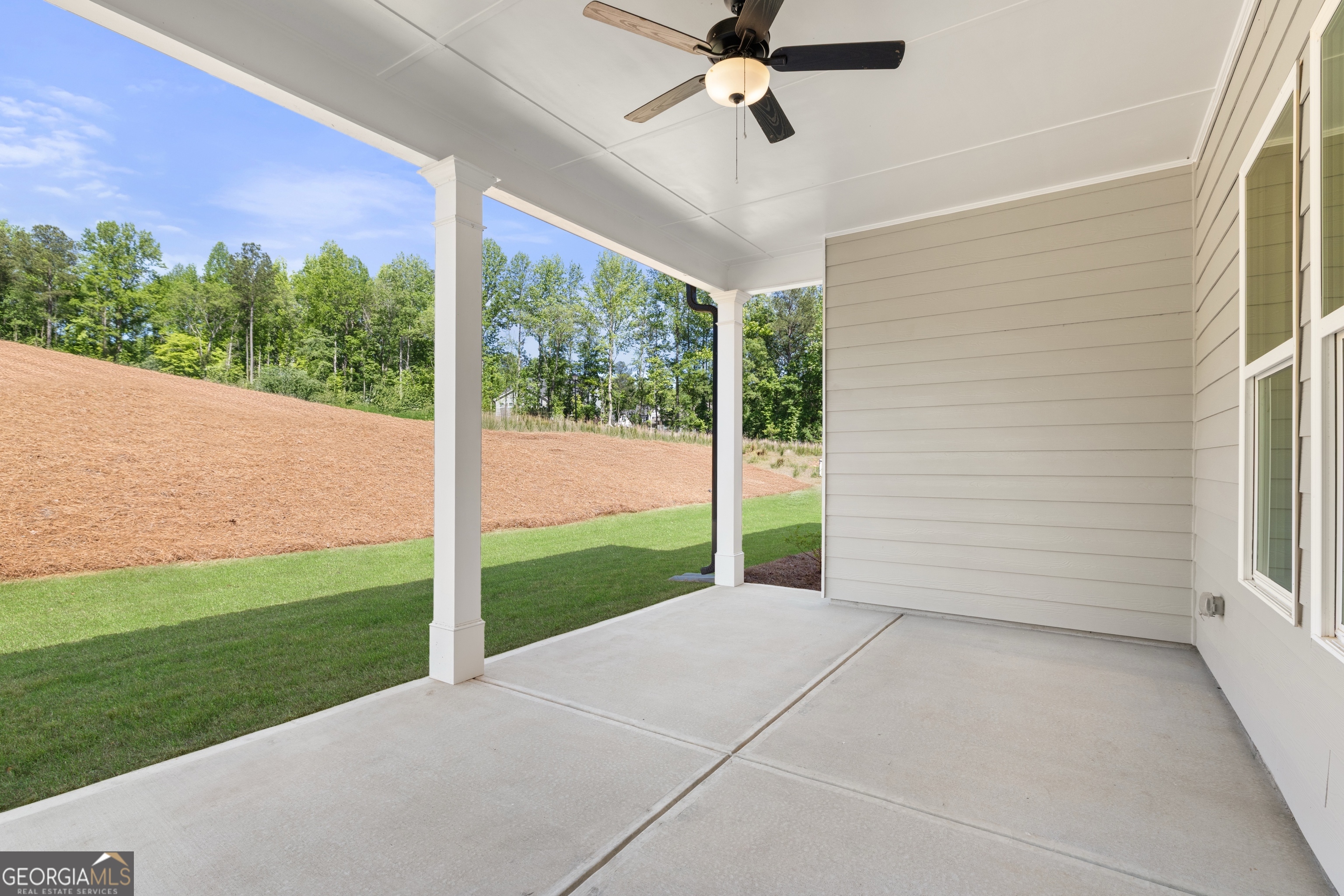 15 Overview Court Hoschton, GA 30548 - Photo 18 of 43 a view of a porch with a backyard