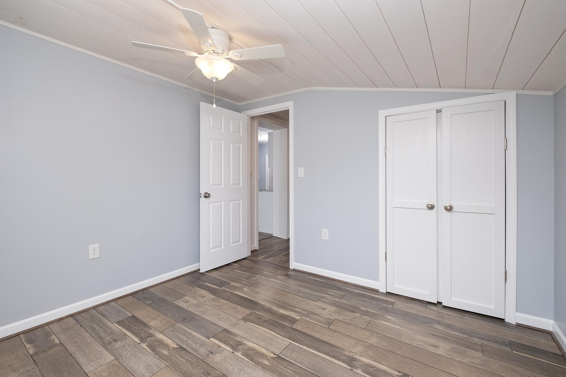 2853 Middlebrook Road Staunton, VA 24401 - Photo 20 of 29 a view of an empty room with wooden floor