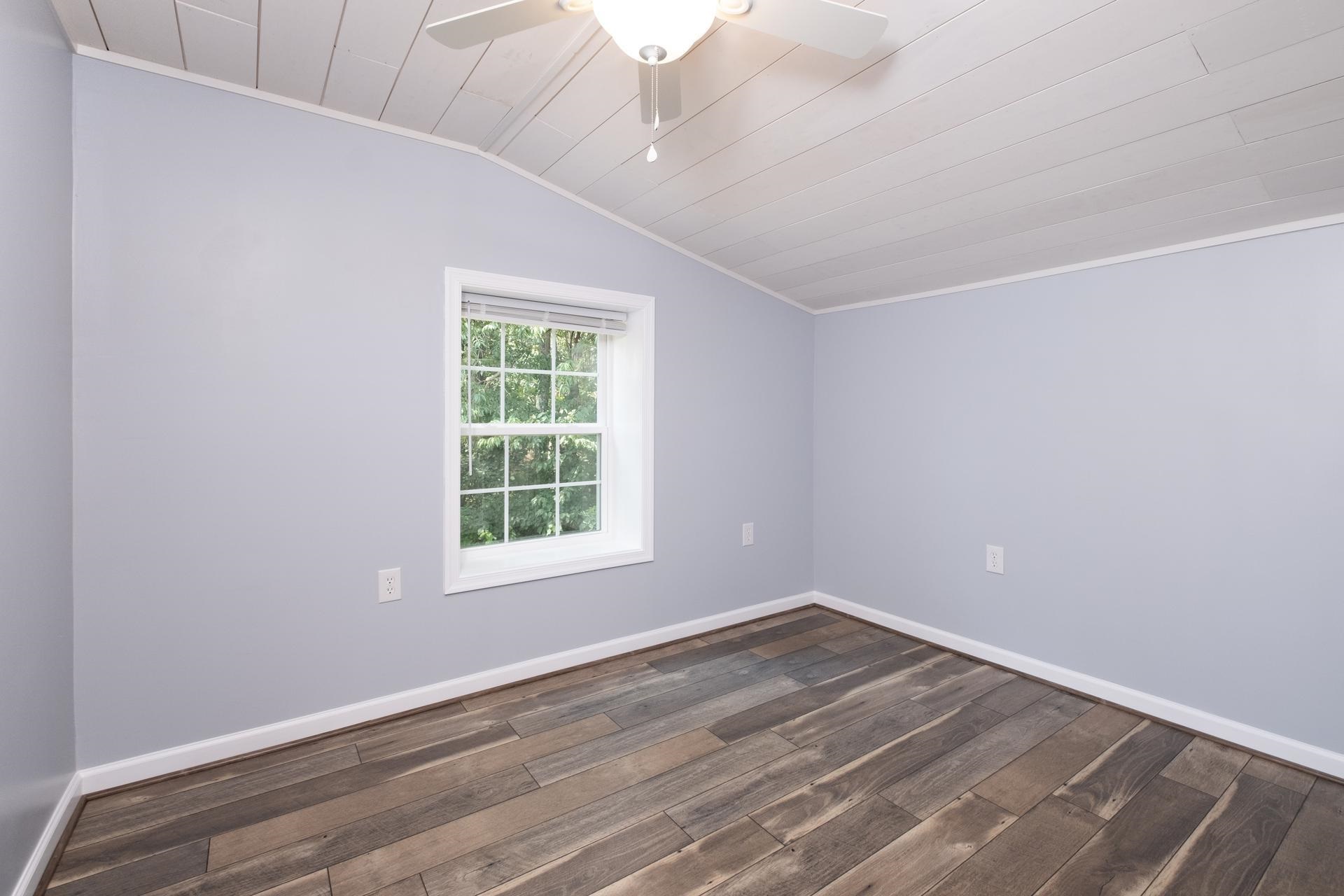 2853 Middlebrook Road Staunton, VA 24401 - Photo 21 of 29 an empty room with wooden floor and windows