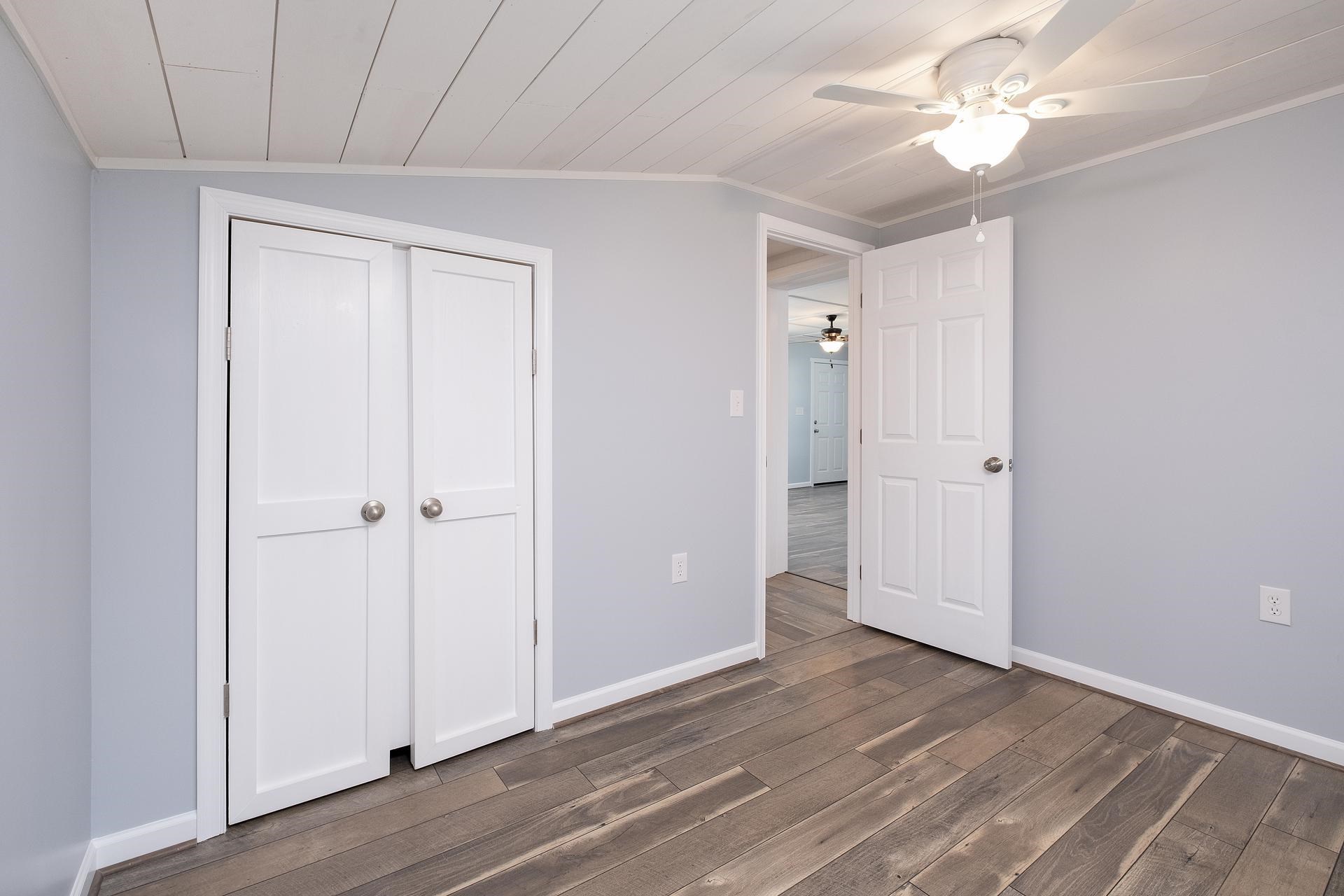 2853 Middlebrook Road Staunton, VA 24401 - Photo 22 of 29 a view of an empty room with window and wooden floor