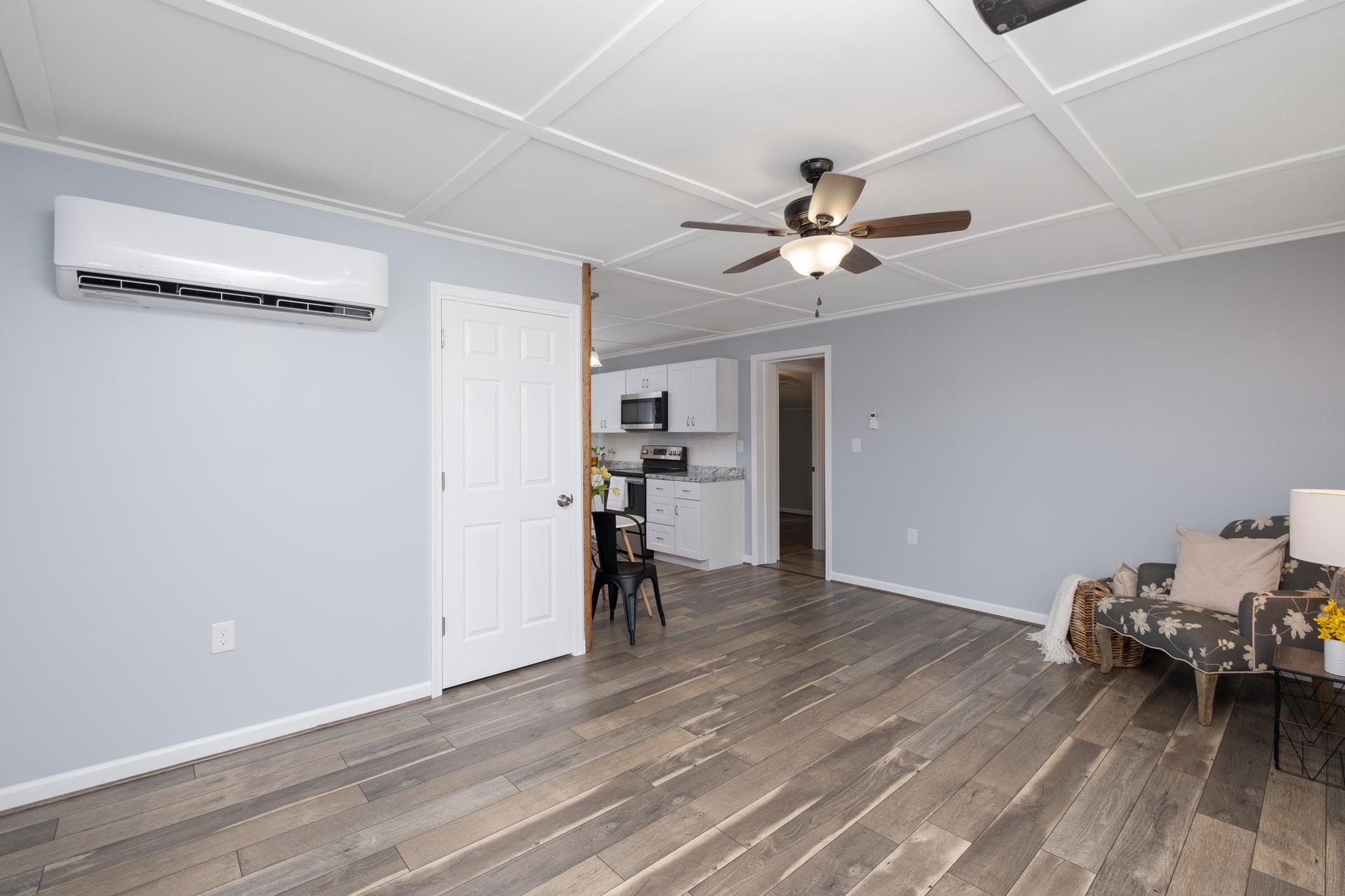 2853 Middlebrook Road Staunton, VA 24401 - Photo 9 of 29 a view of a workspace with furniture and a ceiling fan