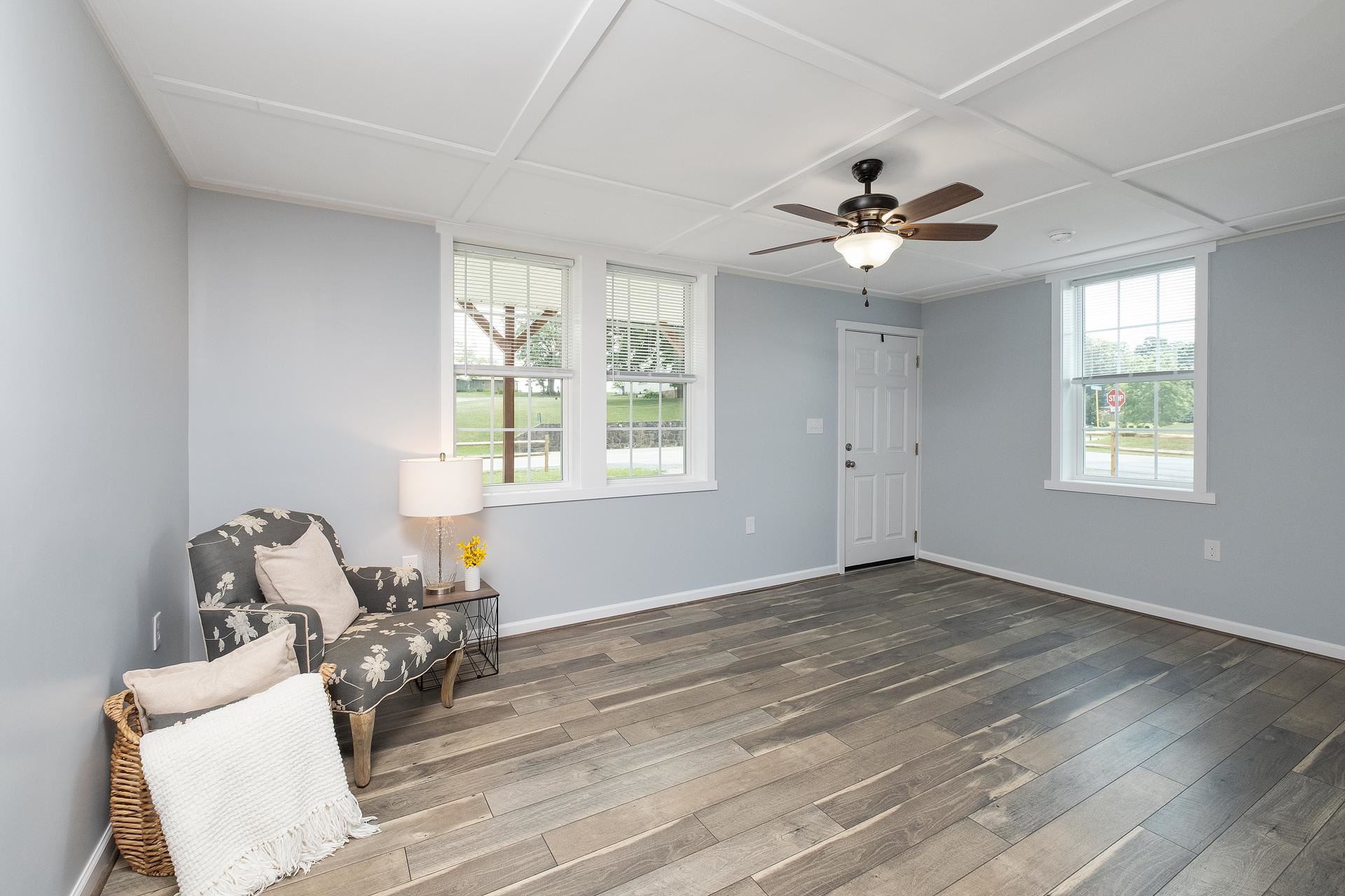 2853 Middlebrook Road Staunton, VA 24401 - Photo 10 of 29 a view of a room with windows ceiling fan and wooden floor