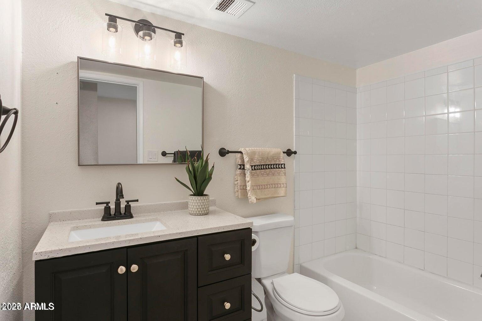 1425 East Desert Cove Avenue, Unit 33 Phoenix, AZ 85020 - Photo 14 of 21 upstairs bath