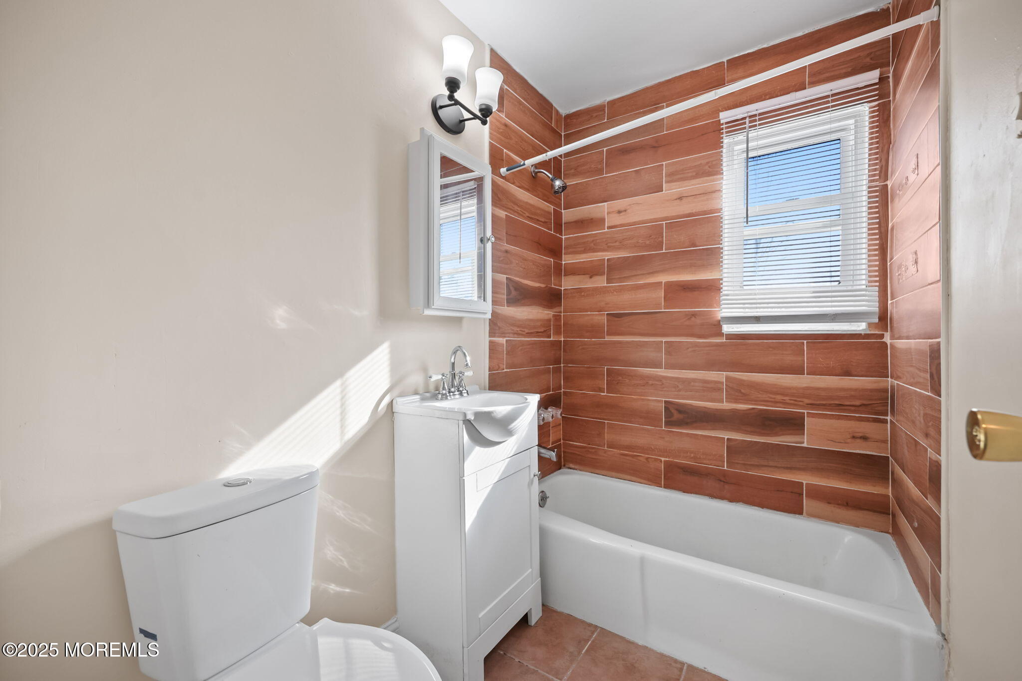 175 Buckelew Avenue, Unit BLDG 4 10 Jamesburg, NJ 08831 - Photo 30 of 31 a bathroom with a bathtub and a toilet