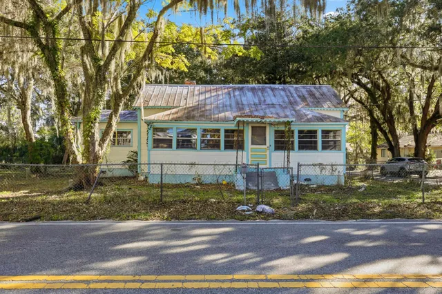 a view of a house with a garden