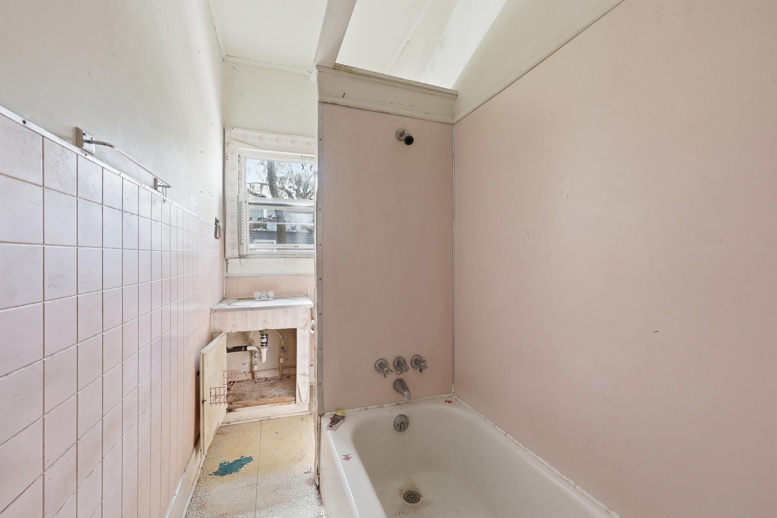 9 Masters Drive St. Augustine, FL 32084 - Photo 21 of 39 a bathroom with a bathtub and a shower