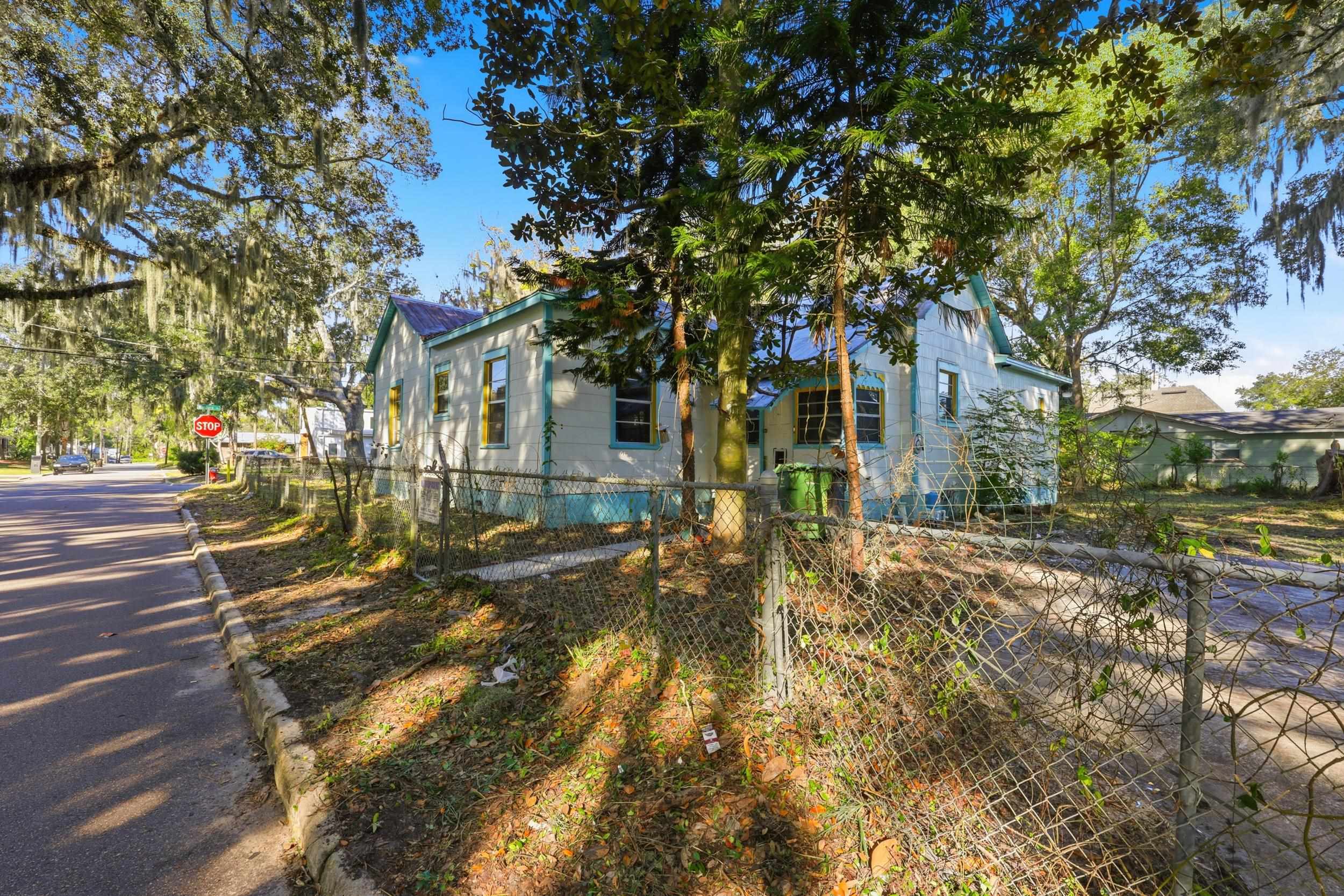 9 Masters Drive St. Augustine, FL 32084 - Photo 24 of 39 a view of a yard with plants and trees