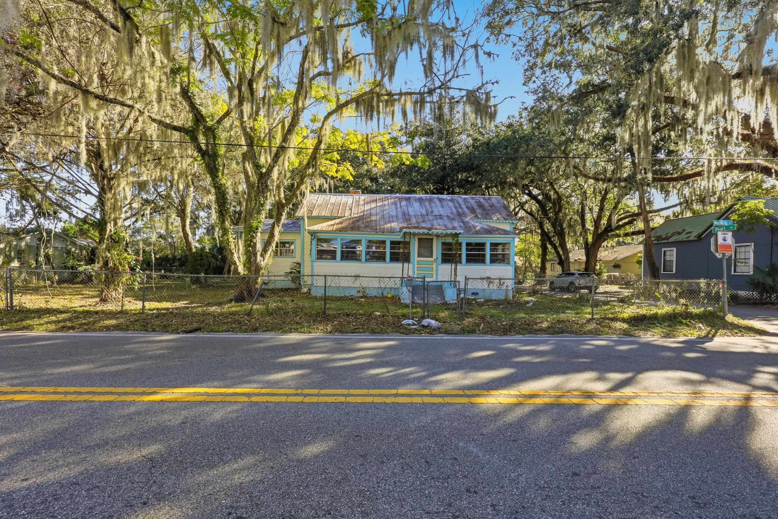 9 Masters Drive St. Augustine, FL 32084 - Photo 25 of 39 a view of a street with houses on both side of it