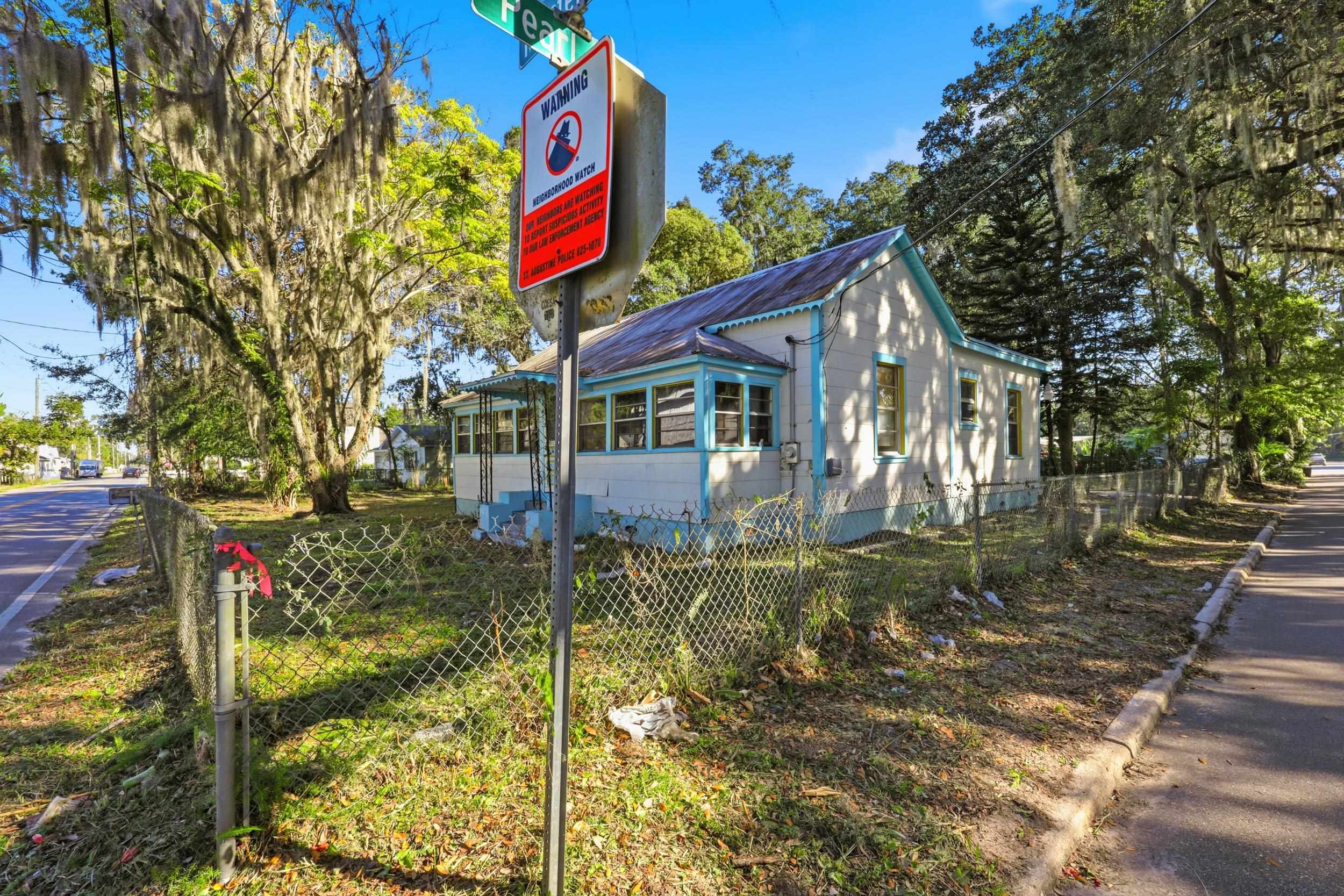 9 Masters Drive St. Augustine, FL 32084 - Photo 26 of 39 a front view of a house with a yard