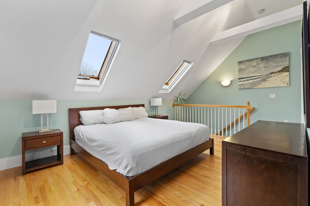 6 Porter Street, Unit 6 Woburn, MA 01801 - Photo 14 of 20 a bedroom with a bed and a night stand