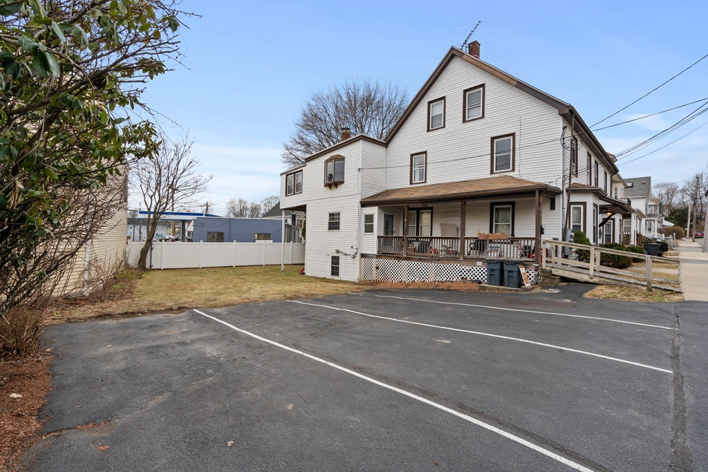 6 Porter Street, Unit 6 Woburn, MA 01801 - Photo 20 of 20 a front view of a building with street