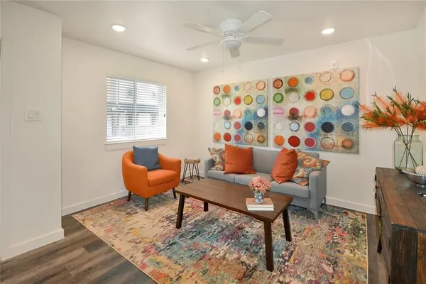 a living room with furniture and a window
