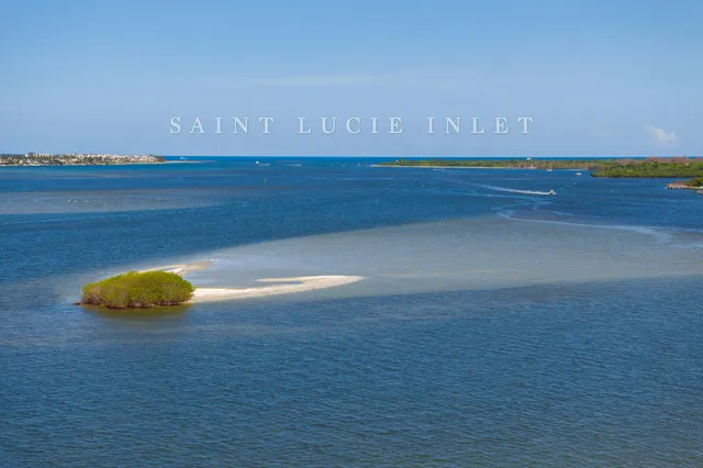 a view of a lake in middle of a city