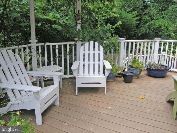 1705 Noyes Lane Silver Spring, MD 20910 - Photo 2 of 30 a view of a deck with furniture and garden