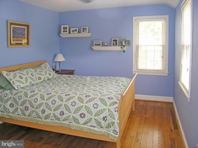 1705 Noyes Lane Silver Spring, MD 20910 - Photo 21 of 30 a view of a bedroom with wooden floor and window