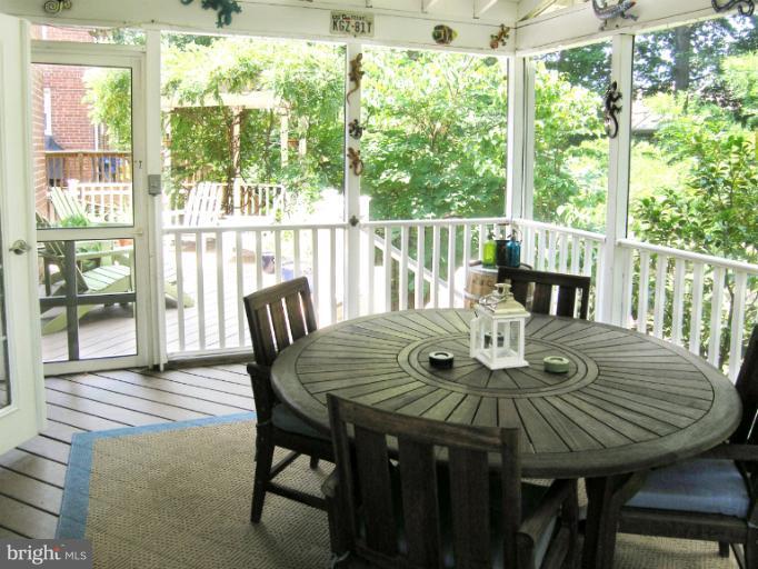 1705 Noyes Lane Silver Spring, MD 20910 - Photo 7 of 30 a view of a dining room with furniture window and outside view