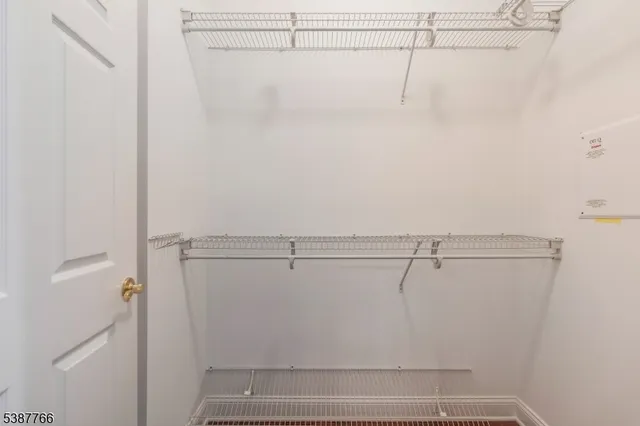 a view of a room with racks on the wall