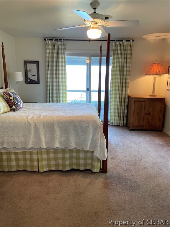 1266 Queenstown Road Lancaster, VA 22503 - Photo 36 of 46 a bedroom with a bed and a cabinets