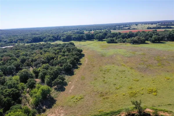 a view of a lake with mountains in the background