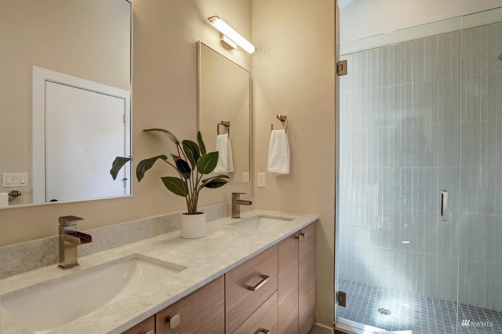 6525 Chapin Place North Seattle, WA 98103 - Photo 18 of 35 a bathroom with a sink and a mirror