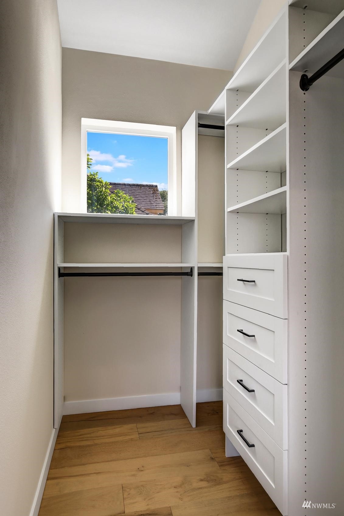 6525 Chapin Place North Seattle, WA 98103 - Photo 22 of 35 a view of an empty walk in closet