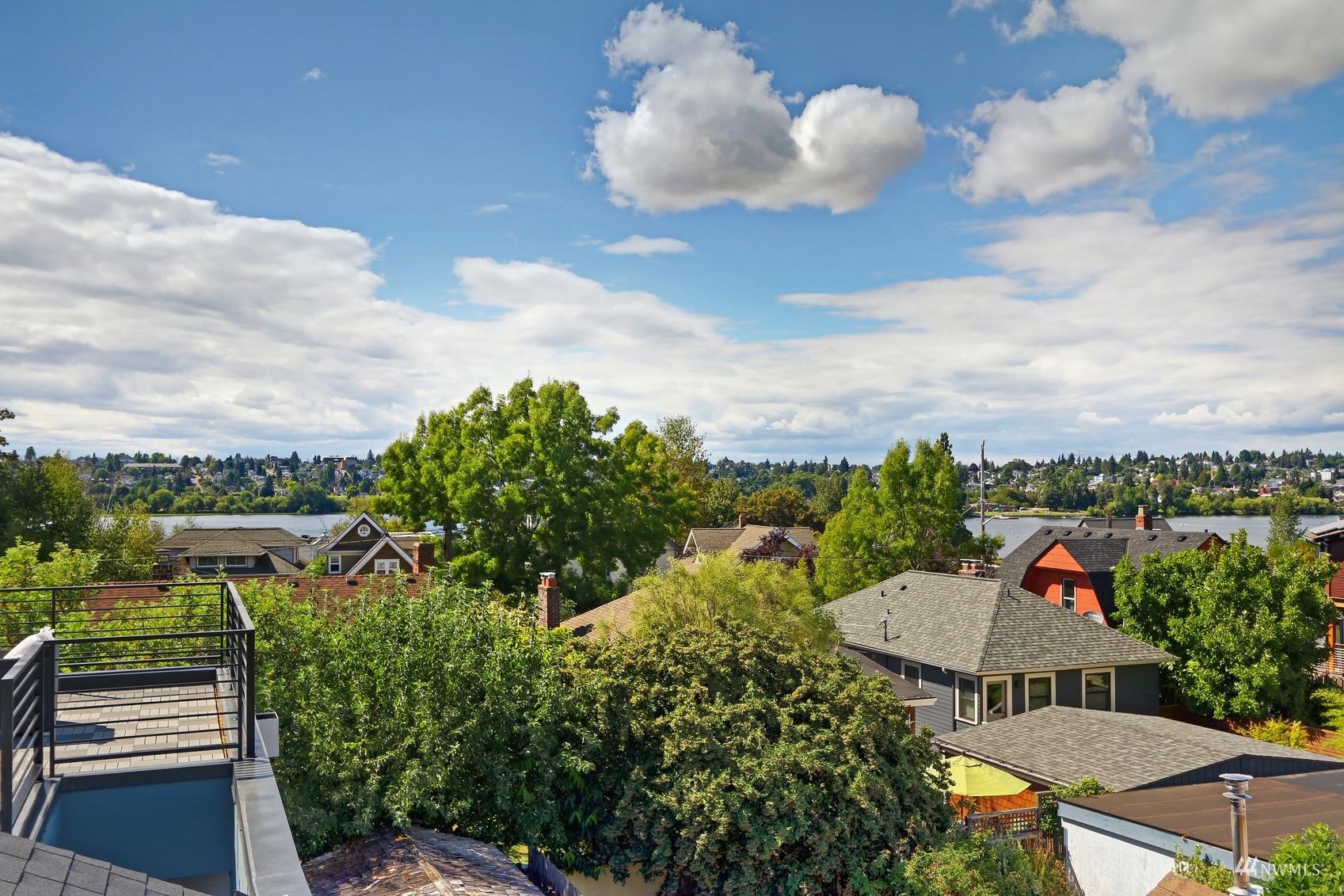 6525 Chapin Place North Seattle, WA 98103 - Photo 26 of 35 a view of a terrace with a table and chairs