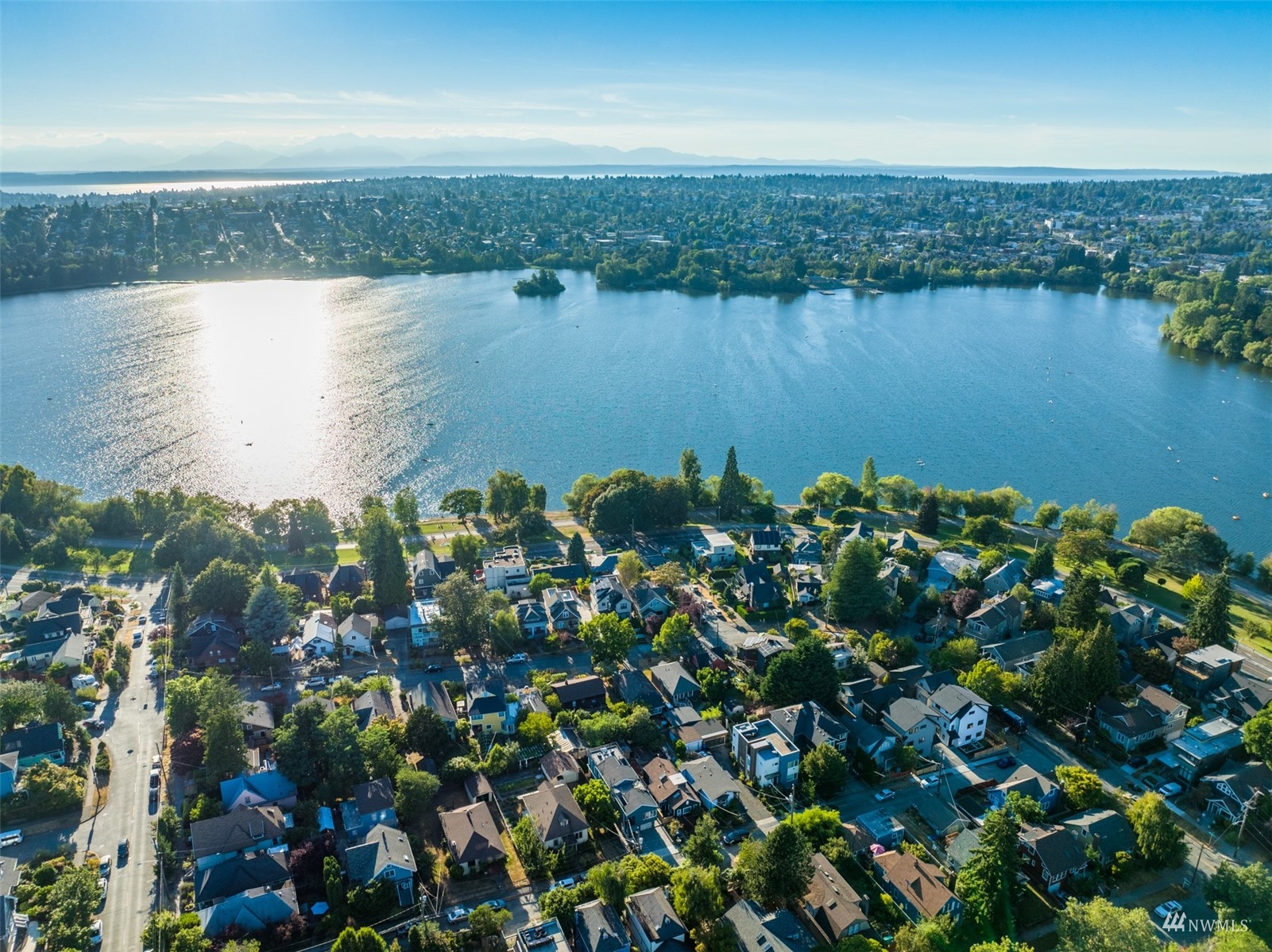 6525 Chapin Place North Seattle, WA 98103 - Photo 29 of 35 a view of a lake with a city