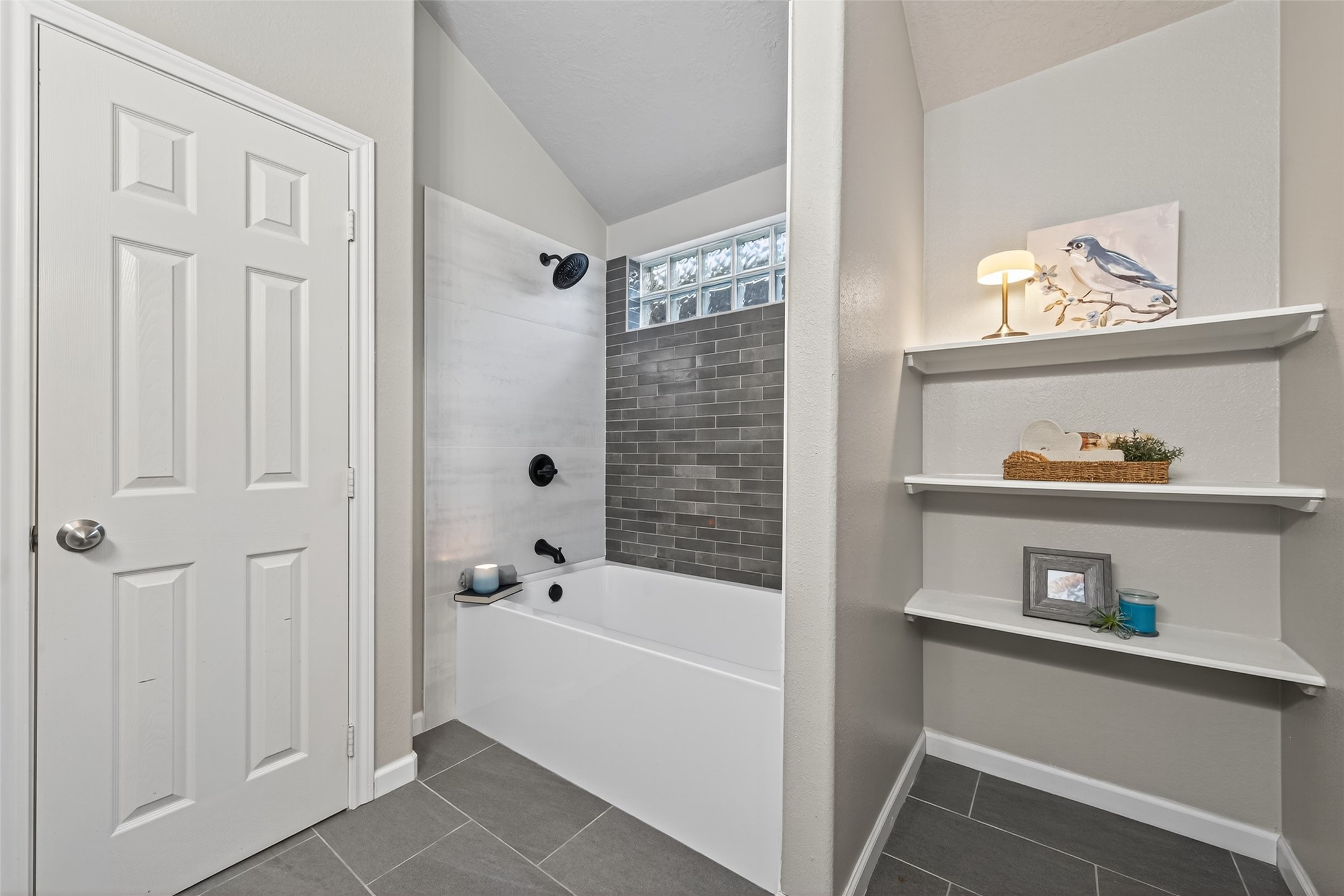2910 Crescent Bend Road Spring, TX 77388 - Photo 17 of 35 a bathroom with a bathtub and a shower