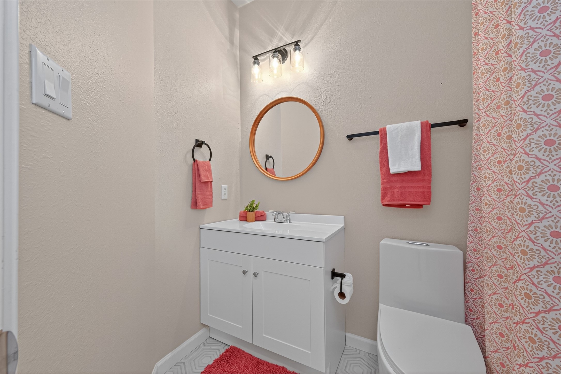2910 Crescent Bend Road Spring, TX 77388 - Photo 19 of 35 a bathroom with a toilet sink vanity and mirror