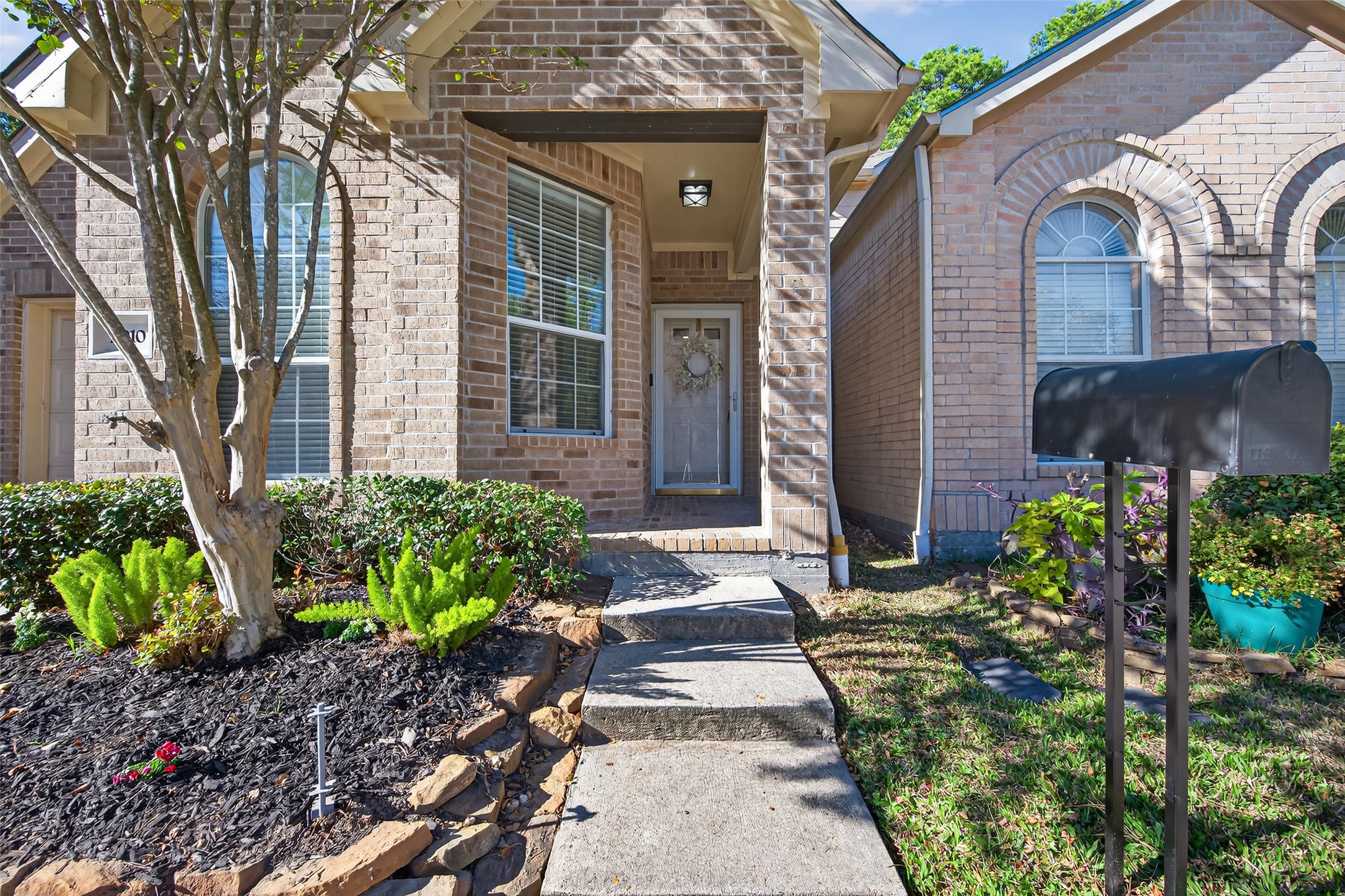 2910 Crescent Bend Road Spring, TX 77388 - Photo 2 of 35 a front view of a house with garden