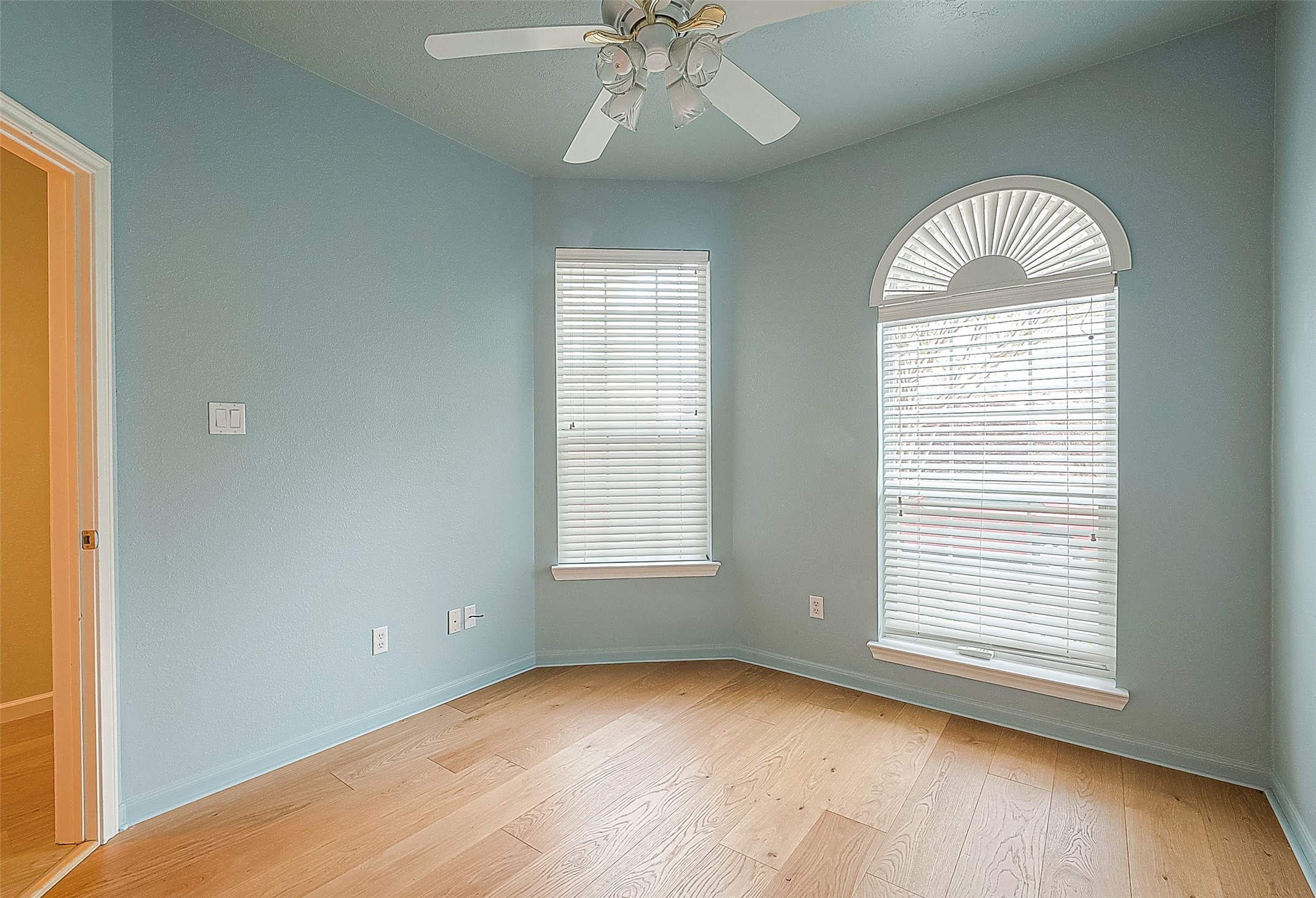 2910 Crescent Bend Road Spring, TX 77388 - Photo 21 of 35 an empty room with a window and wooden floor