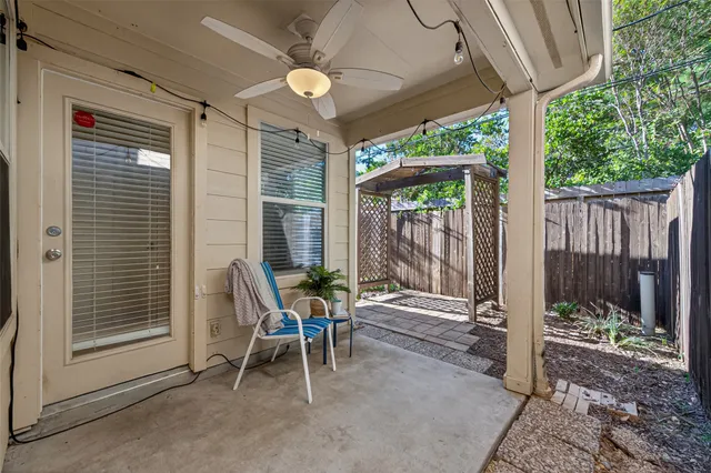 a chair and a table in a patio