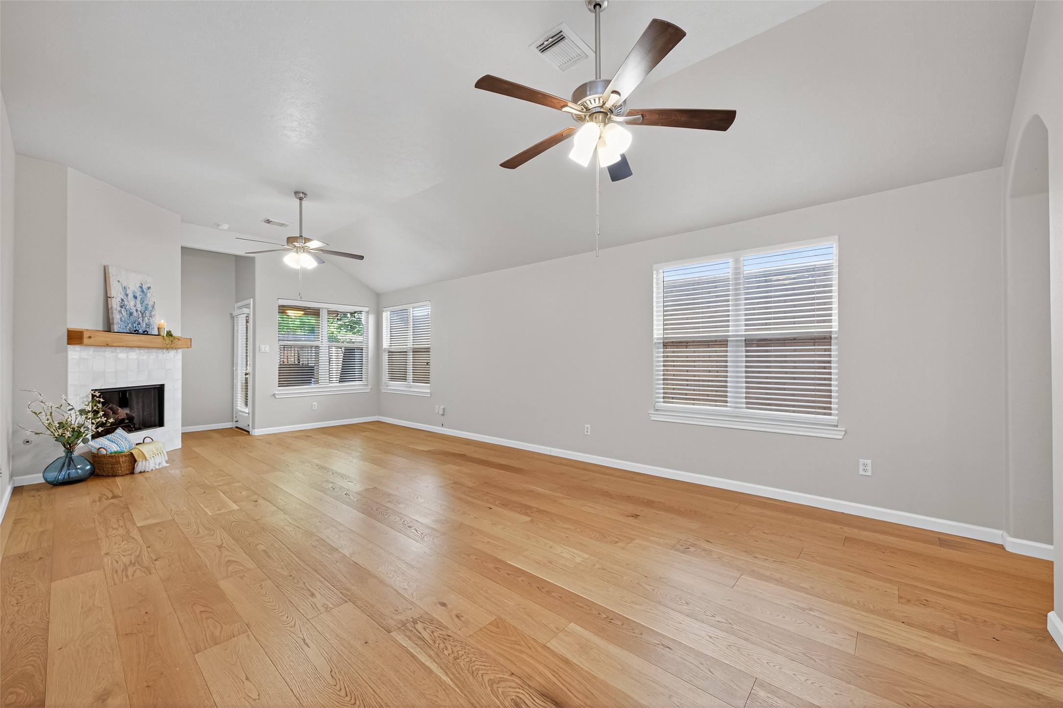 2910 Crescent Bend Road Spring, TX 77388 - Photo 6 of 35 a view of an empty room with wooden floor and a window