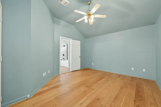 a en suite bathroom with a sink and a mirror