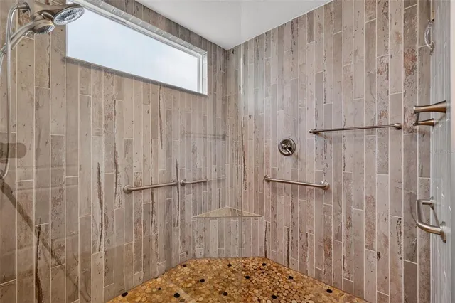 a bathroom with a shower curtain