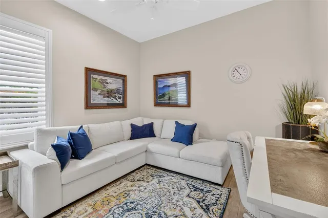 a living room with furniture and a couch