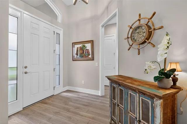 a view of entryway with wooden floor
