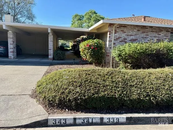 a sign on the side of a road