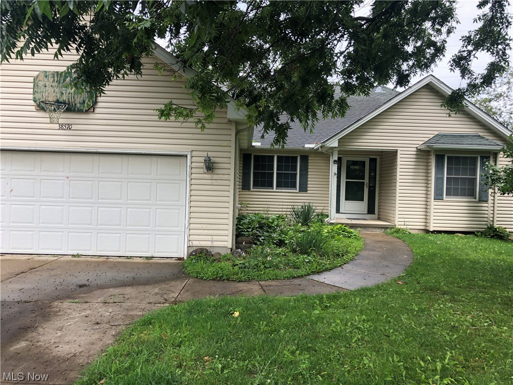 38570 Detroit Road Avon, OH 44011 - Photo 1 of 29 front of house with attached garage