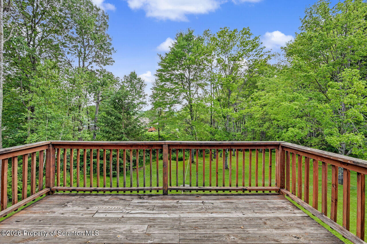 211 Buckingham Street Moscow, PA 18444 - Photo 40 of 83 a view of a wooden roof deck