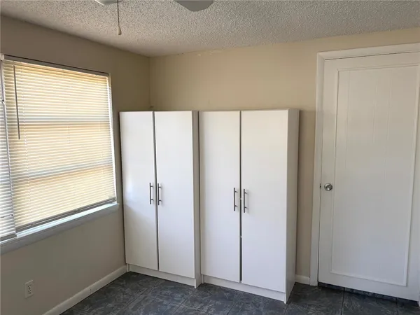 a view of a backyard with a fountain